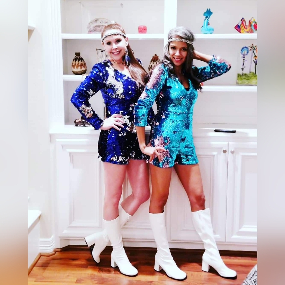 One pink and blue sequin jumper. Selling the jumper on the right. Small